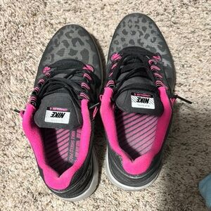 Nike Black and Pink Athletic Shoes with Animal Print